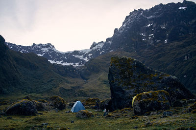 Scenic view of snowcapped mountains against sky