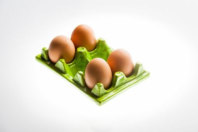 Close-up of pastry on white background