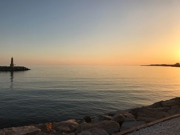 Scenic view of sea against sky during sunset