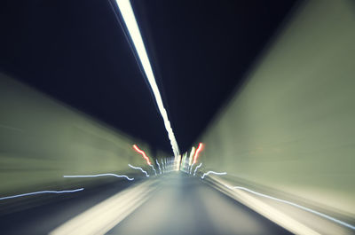 Light trails on road in tunnel