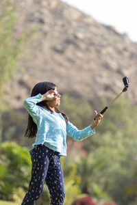 Woman standing outdoors