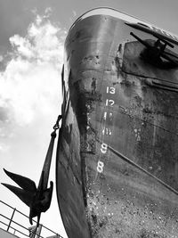 Close-up of airplane against sky