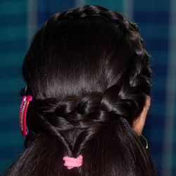 Rear view of woman with braided hair