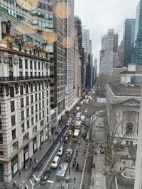 High angle view of street amidst buildings in city