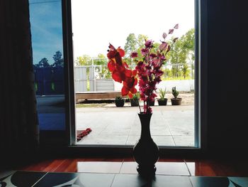 Flower vase on window sill