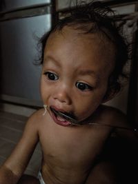 Portrait of cute baby girl at home