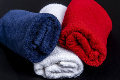 Close-up of human hand against black background