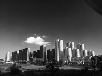 Modern cityscape against sky