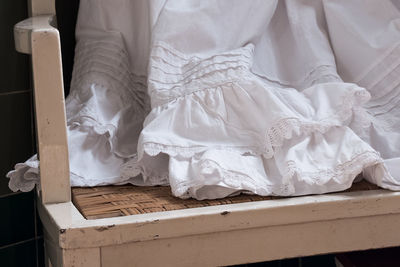 White dress on table at home