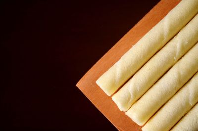 High angle view of paper against black background