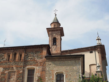 Low angle view of historic building against sky