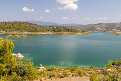 Scenic view at the gadoura water reservoir on rhodes island, greece with blue and turquoise water