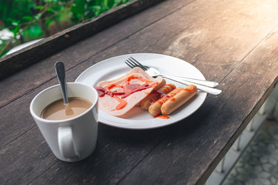 High angle view of breakfast served on table