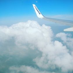 Low angle view of airplane flying in sky