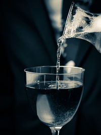 Close-up of wineglass on glass