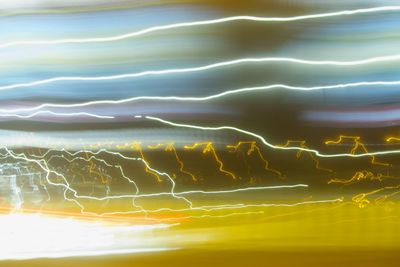 Full frame shot of illuminated sky at sunset