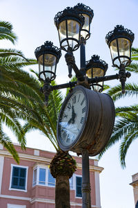 Low angle view of street light against sky