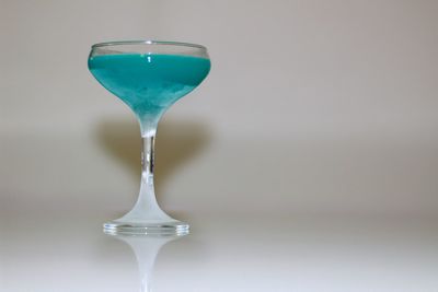 Close-up of drink against white background