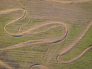 Aerial view of motocross tracks on a filed