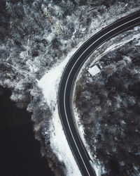 High angle view of car on snow covered landscape