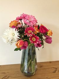 Close-up of pink flowers in vase on table