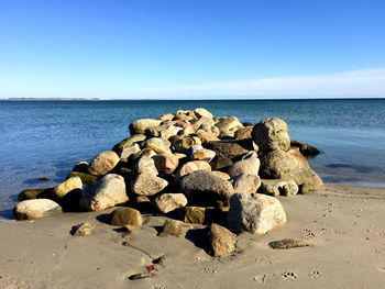 Scenic view of rocks on beach