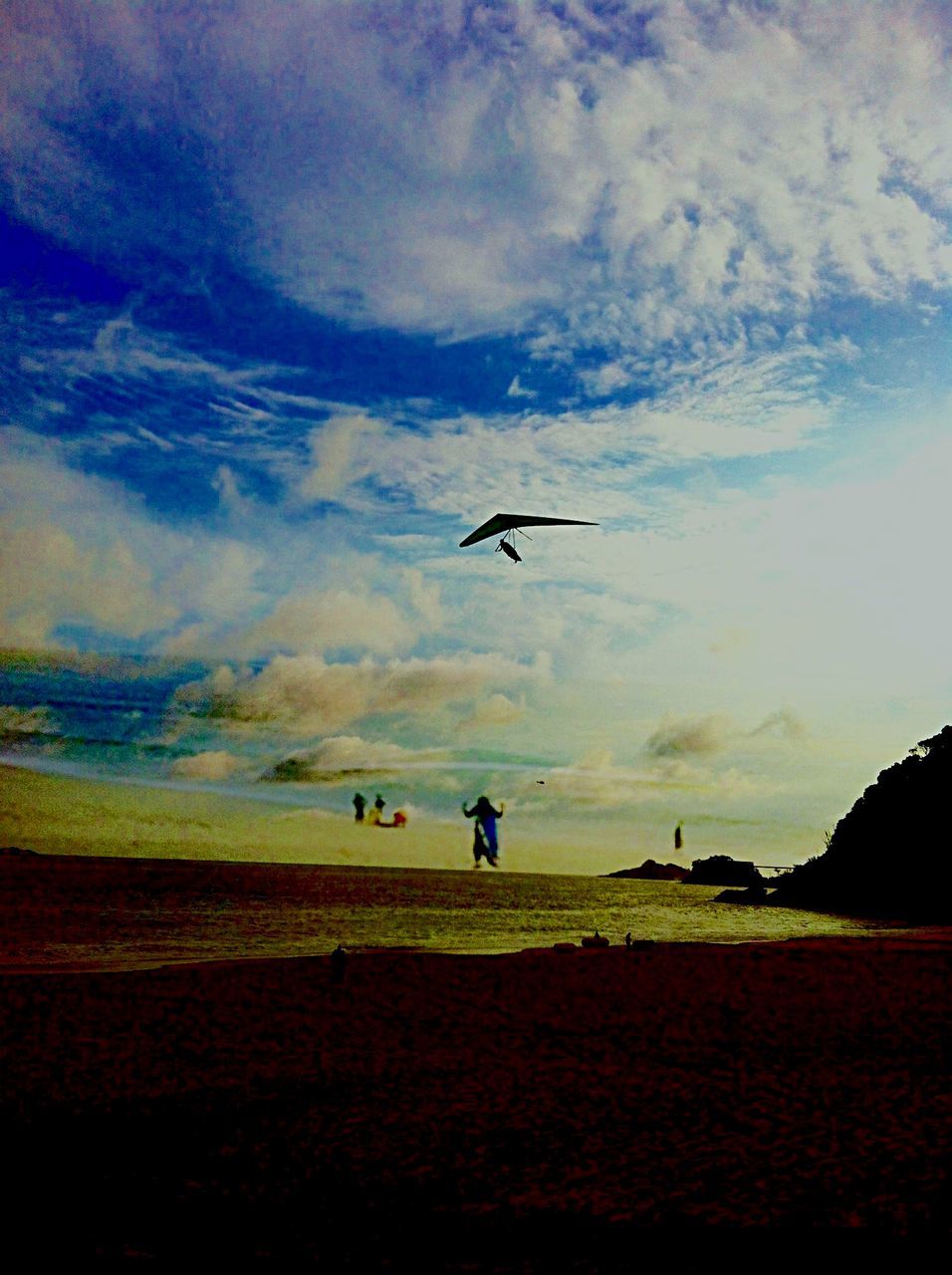 sky, beach, sea, tranquil scene, scenics, cloud - sky, water, tranquility, bird, shore, silhouette, beauty in nature, nature, sunset, flying, horizon over water, sand, cloud, one person, landscape