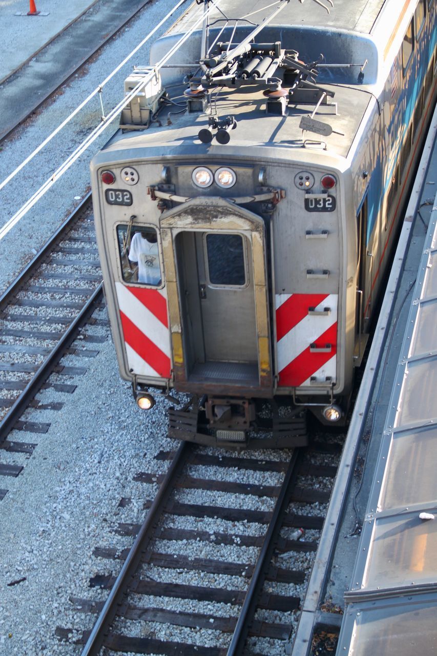 HIGH ANGLE VIEW OF TRAIN ON RAILROAD STATION