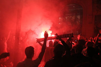 People enjoying music concert