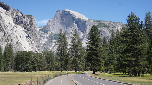 El capitan and half dome granite monolith mountain peaks in the yosemite national park of california