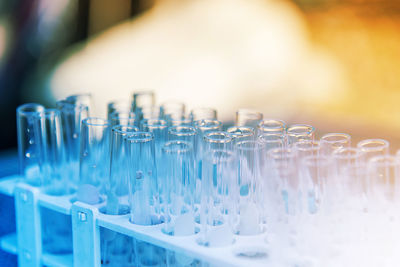 Close-up of empty test tubes in rack