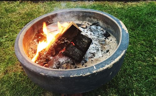 High angle view of bonfire on field