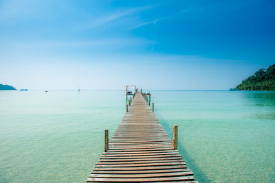 Pier on sea against sky