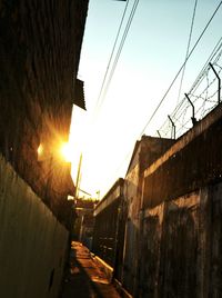 View of railroad tracks against sky during sunset