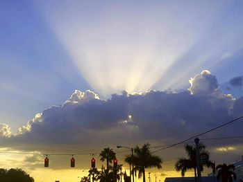 People against sky during sunset