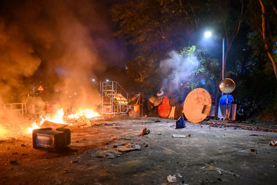 Panoramic view of people at night