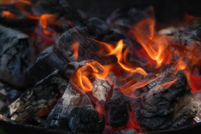 Close-up of coal burning in barbecue