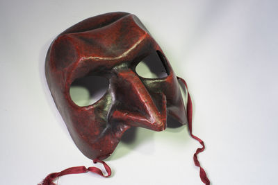 Close-up of mask on table