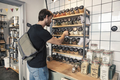 Male customer shopping at organic store