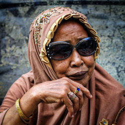 Portrait of woman smoking cigarette