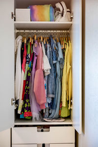 Clothes hanging in rack