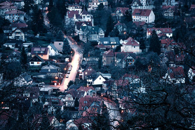 High angle view of illuminated buildings in city