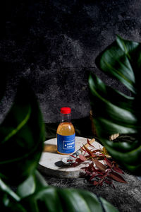 Close-up of wine bottle on table