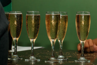 Close-up of wine champagne flute on table