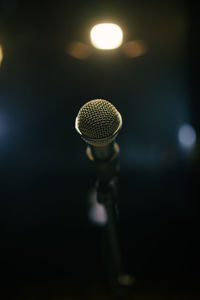 Old microphone on stage closeup.