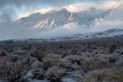 Scenic view of snowcapped mountains against sky