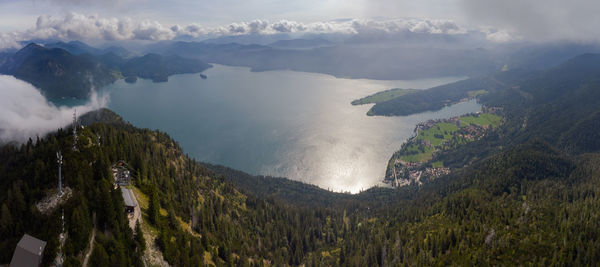 High angle view of land and mountains against sky