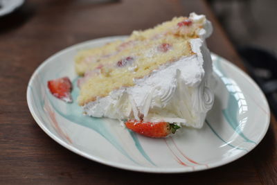 Close-up of cake served in plate on table