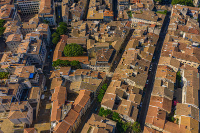 High angle view of street amidst buildings in city