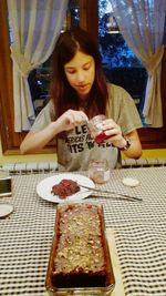 Young woman holding food